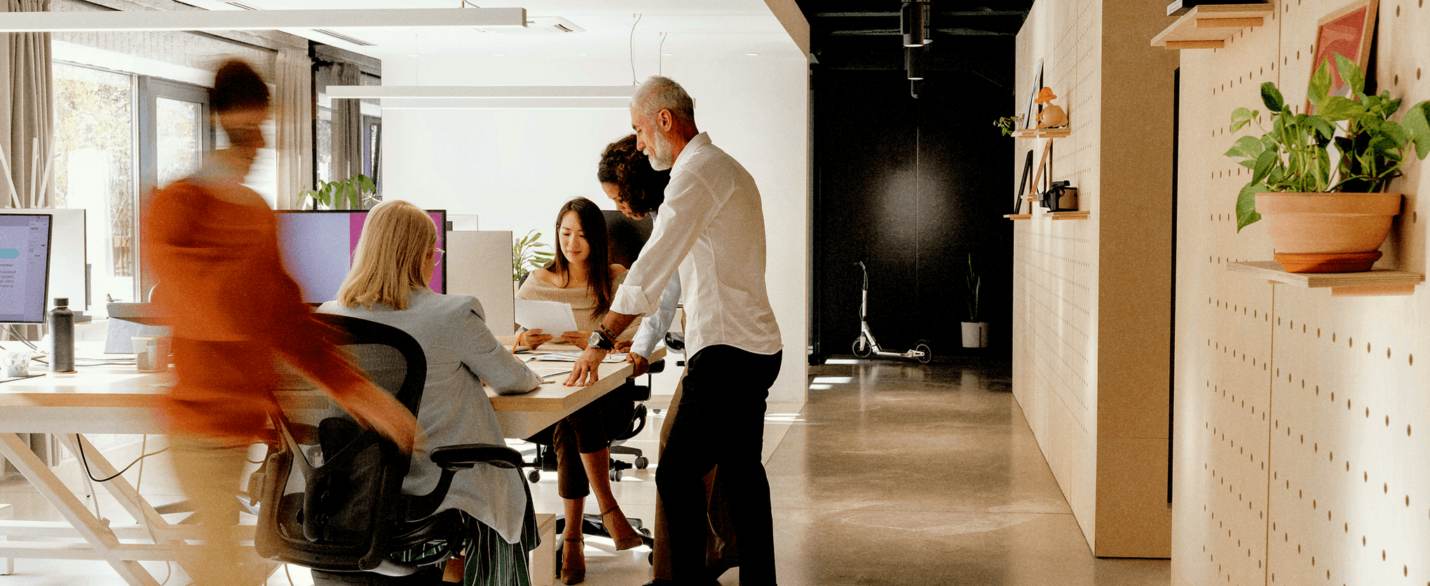 Team reviewing an AI copilot tool at a financial services firm